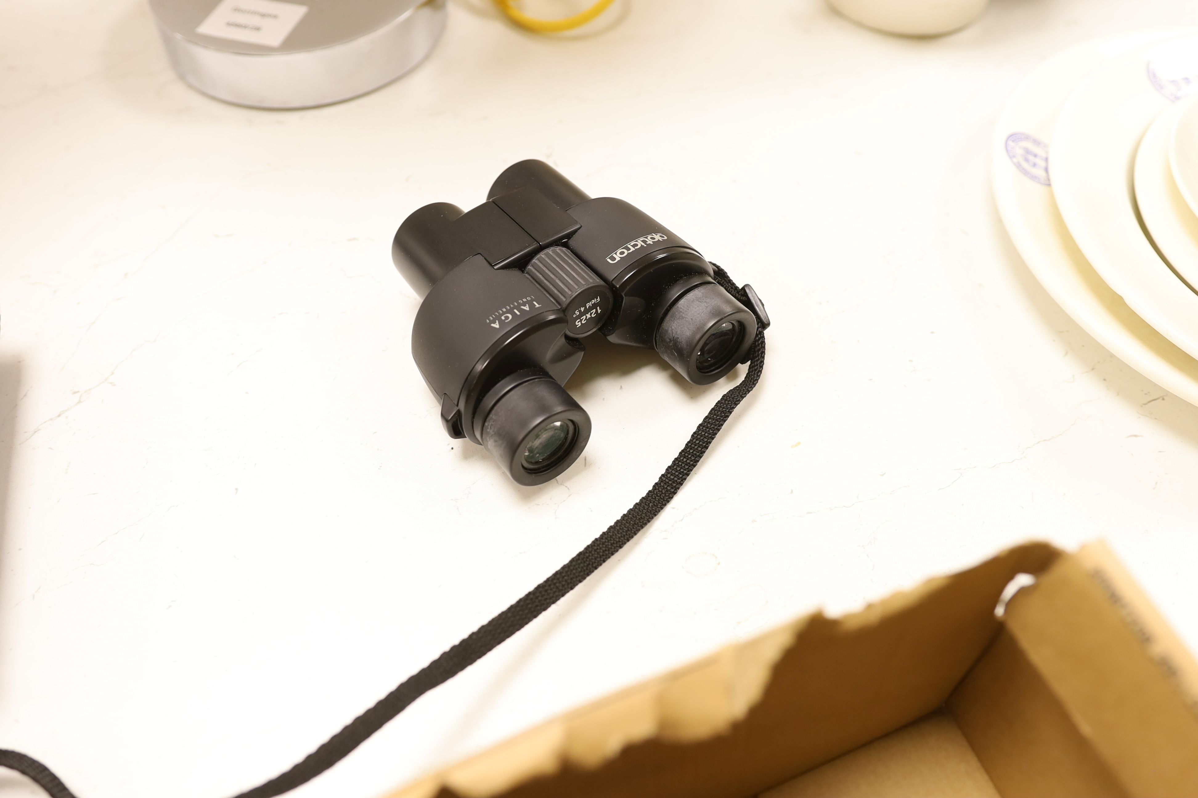A pair of Taiga binoculars, various cameras etc.